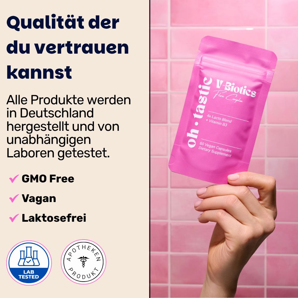 Rosa Beutel V-Biotics in Hand. Text: GMO Free, Vegan, Laktosefrei. Lab getestet. Apotheken Produkt.