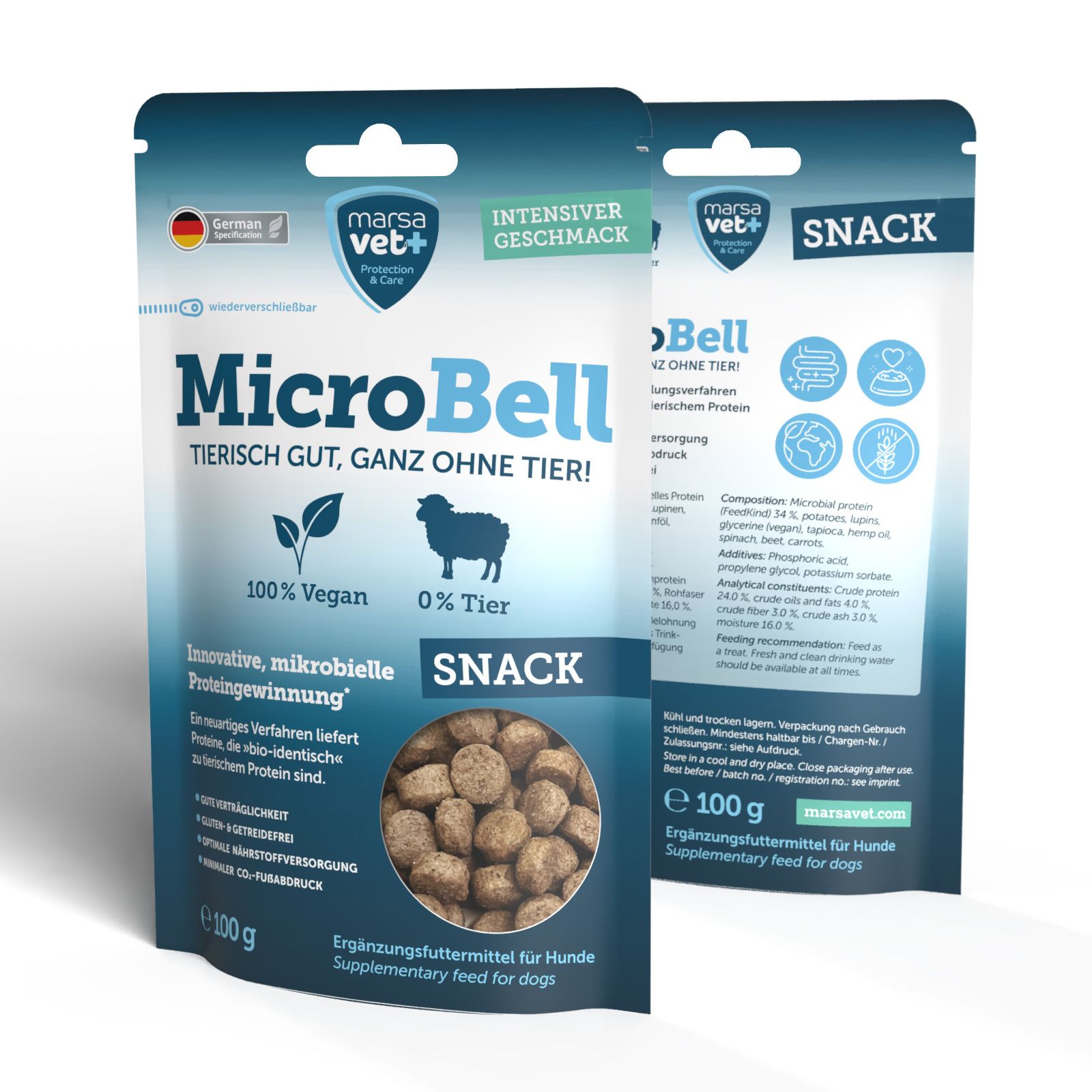 Zwei Snack-Packungen Hundefutter. Aufdruck: MicroBell, 100% vegan, 0% Tier. Snack-Futterstückchen sichtbar. 100g.