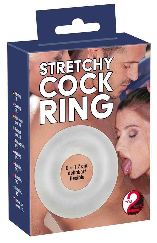 Verpackung mit weißem, flexiblem Ring. Aufdruck: "Stretchy Cock Ring". Marke: YOU 2 TOYS. Abgebildet sind Personen.
