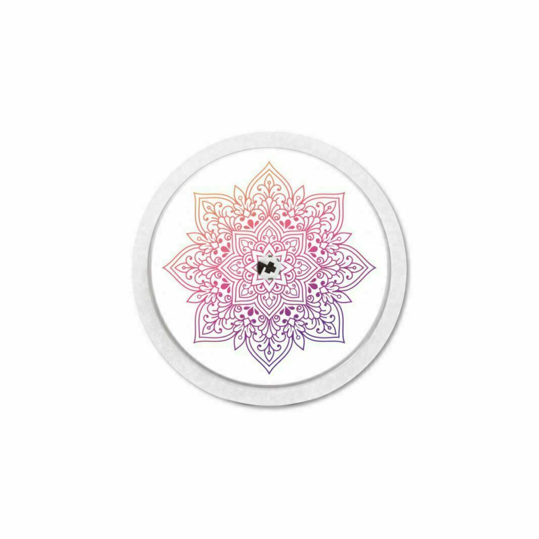 Runder Aufkleber mit Mandala-Design in Rosa- und Gelbtönen. Ein kleines schwarzes Element befindet sich in der Mitte.
