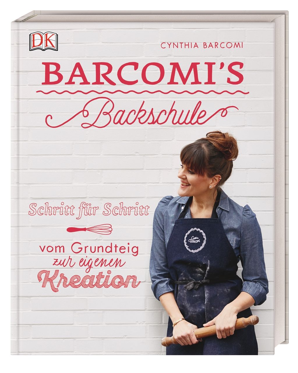 Buchcover mit Titel "Barcomi's Backschule". Frau mit Schürze und Nudelholz. DK-Logo oben links.