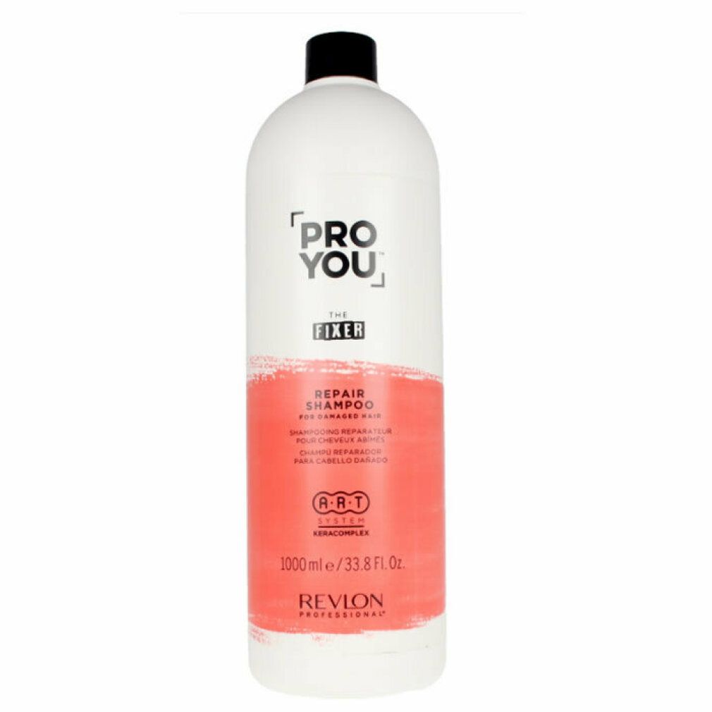 Weiße Shampoo-Flasche mit schwarzem Deckel. Aufschrift: PRO YOU THE FIXER REPAIR SHAMPOO. Marke Revlon Professional.