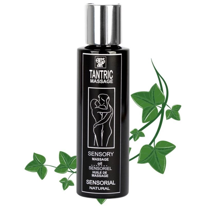 Schwarze Flasche mit silbernem Deckel. Aufschrift: Tantric Massage, Sensory Massage Oil. Grünpflanze im Hintergrund.