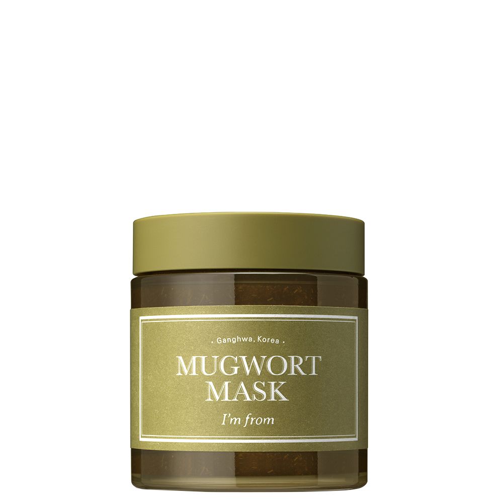 Glas der Mugwort Maske. Aufschrift: I'M FROM Mugwort Mask. Braunes Glas mit grünem Deckel und Etikett.