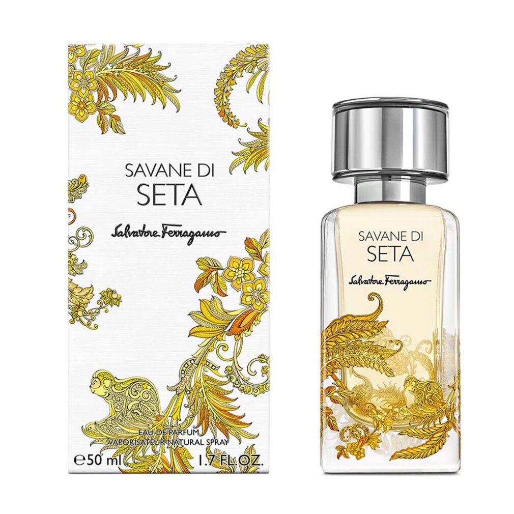 Parfümflakon und Verpackung. Aufschrift: Savane Di Seta, Salvatore Ferragamo. Goldene Verzierungen auf weißem Hintergrund.