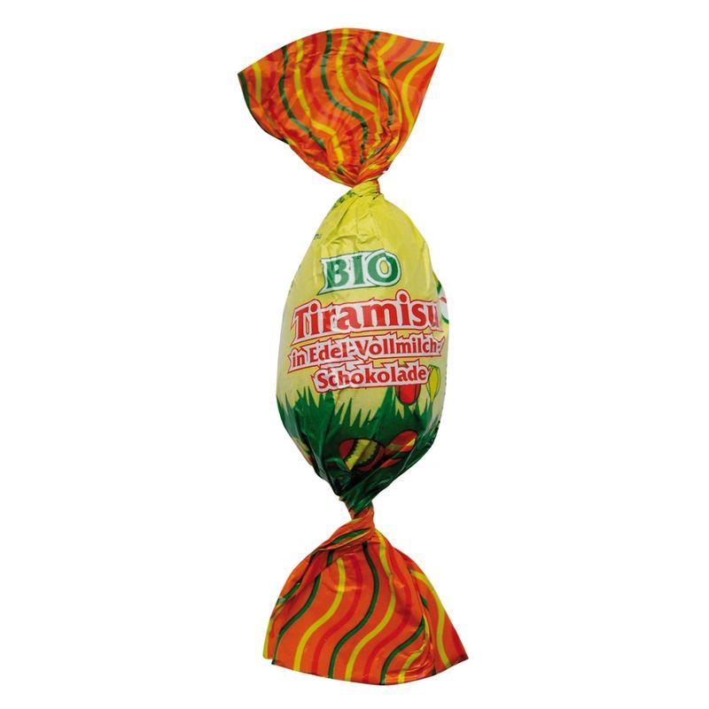 Einzeln verpacktes Ei in Vollmilchschokolade. Gelbe Verpackung mit Aufdruck: BIO Tiramisu in Edel-Vollmilch Schokolade.
