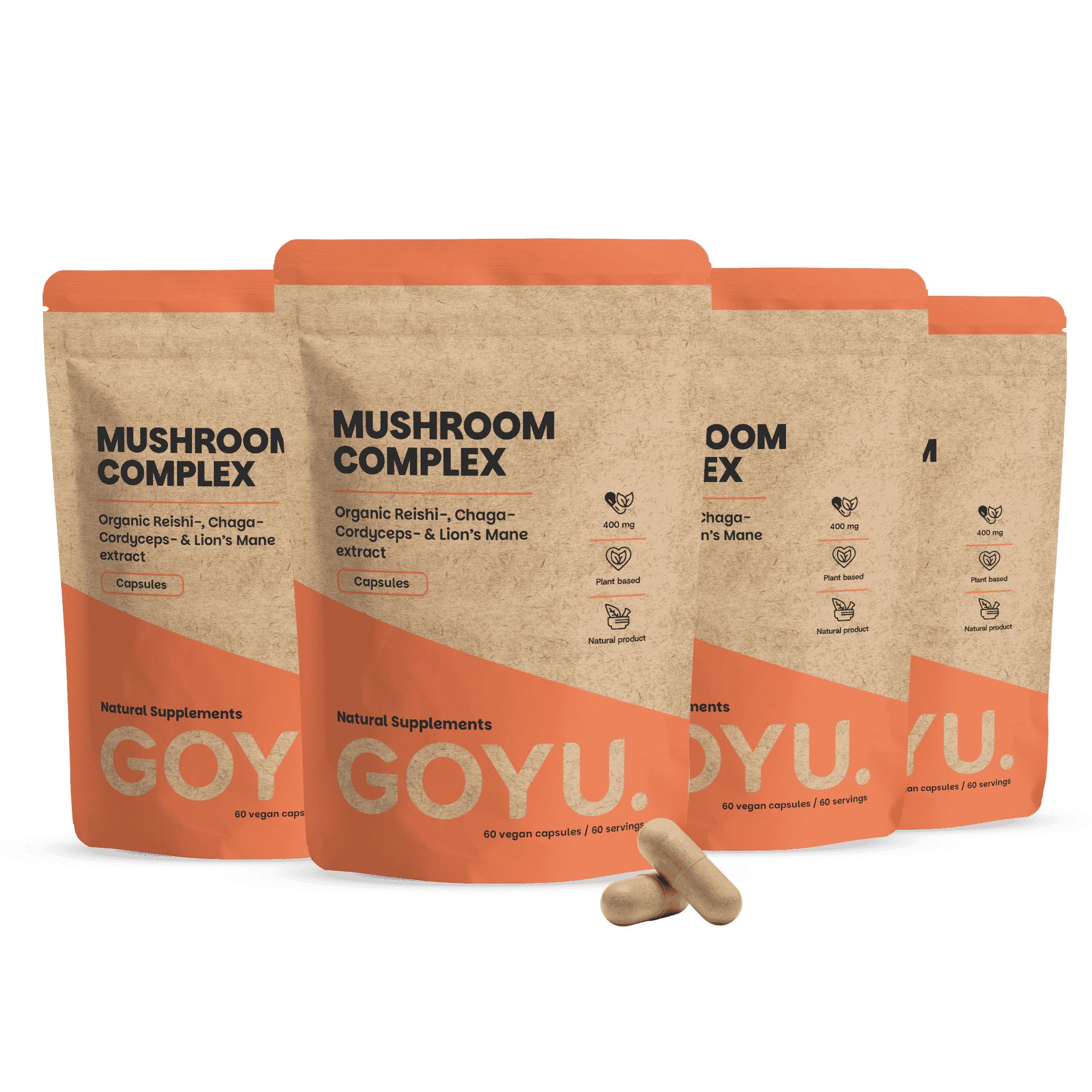 Vier Packungen GOYU Mushroom Complex Kapseln, eine Packung geöffnet, zwei Kapseln daneben.