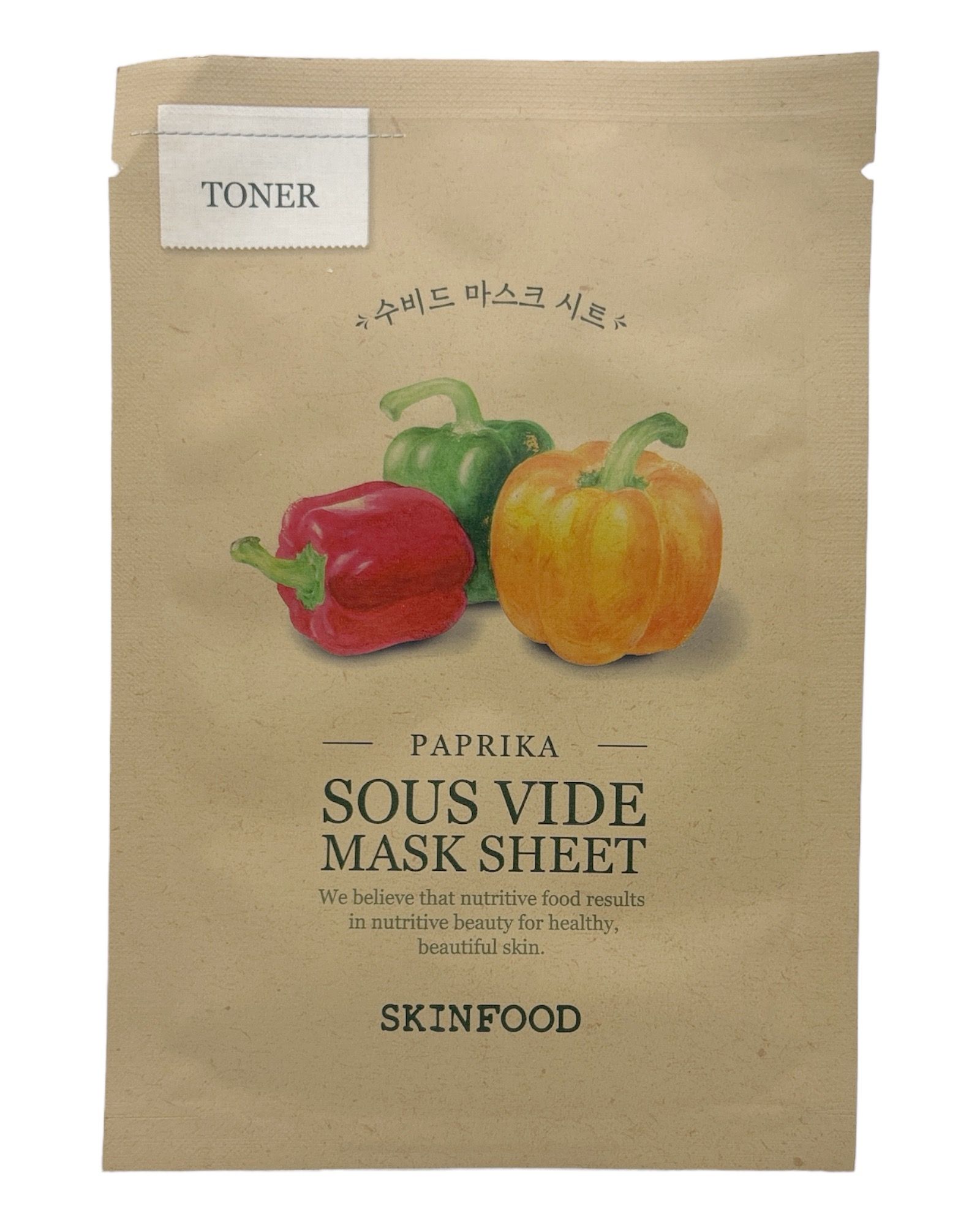 Verpackung mit Paprika-Motiv. Aufschrift: "Sous Vide Mask Sheet". Enthält Paprika-Abbildungen und den Markennamen SKINFOOD.
