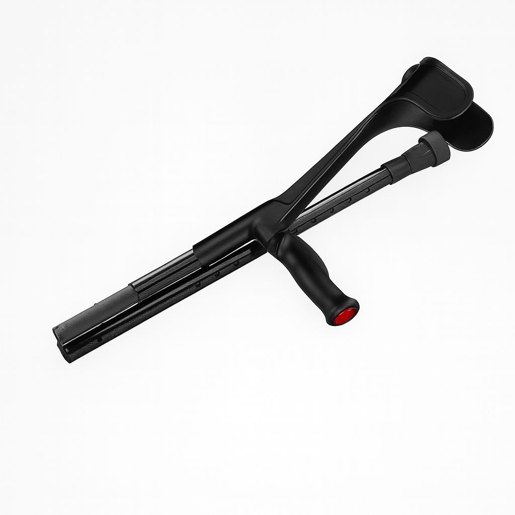 Schwarze Gehhilfe, zusammengeklappt. Griff mit roter Spitze. Oberteil mit Armauflage.