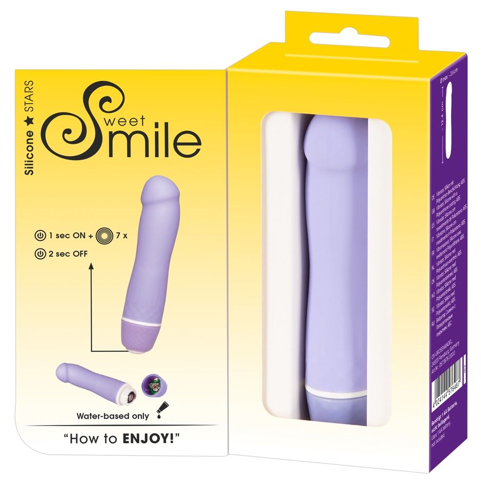 Lila Vibrator in Verpackung. Auf der Verpackung steht "Sweet Smile Mini Vibrator".