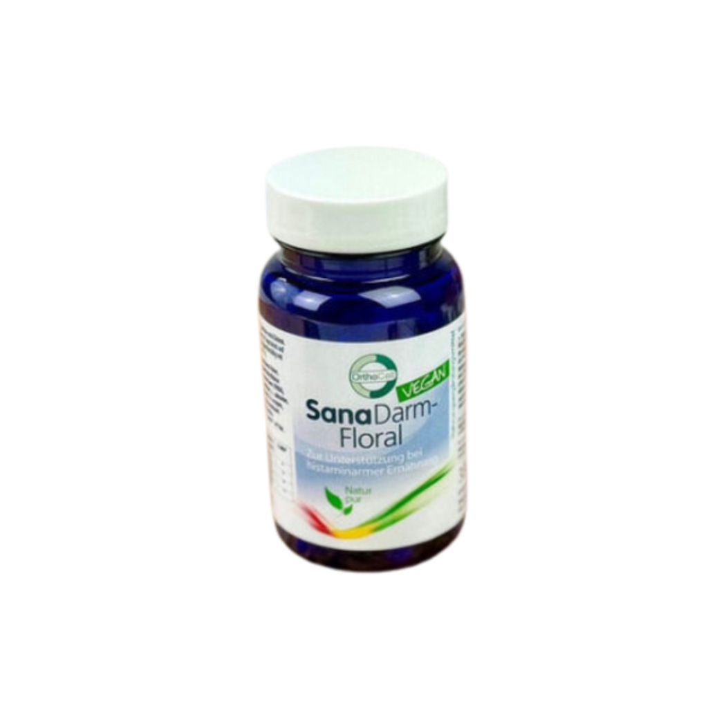 Blaue Flasche mit weißem Deckel. Aufschrift SanaDarm-Floral. Vegan-Siegel. Etikett mit Produktinformationen.