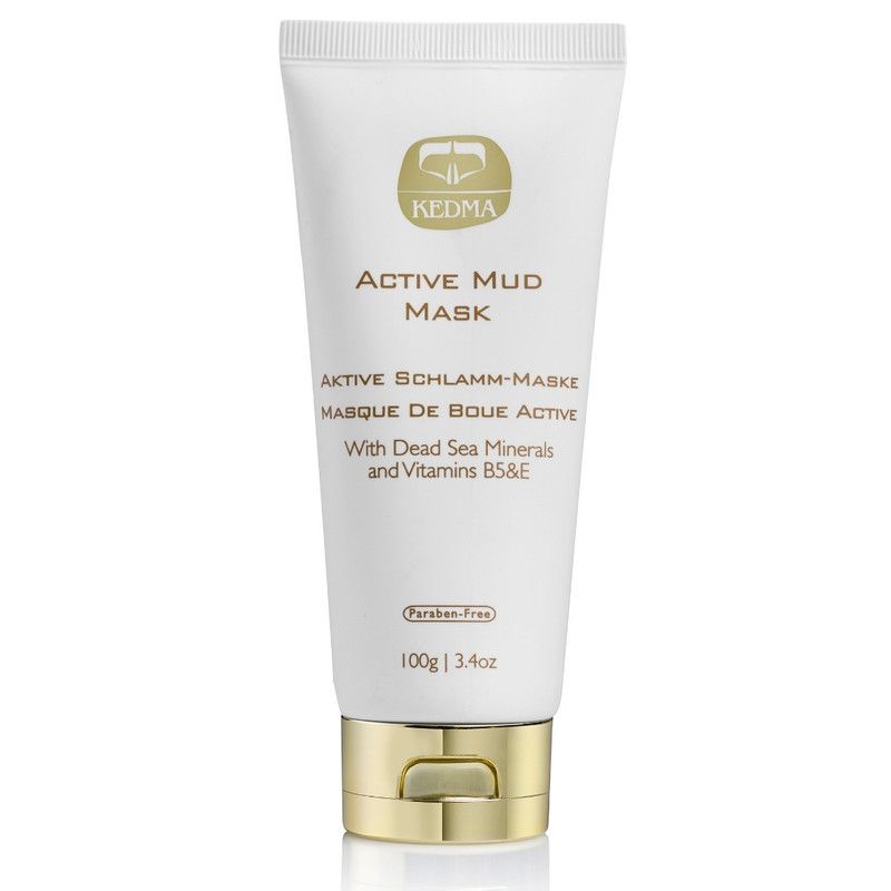 Weiße Tube mit goldfarbenem Verschluss. Aufschrift: KEDMA, ACTIVE MUD MASK, AKTIVE SCHLAMM-MASKE, MASQUE DE BOUE ACTIVE. Enthält Mineralien und Vitamine.