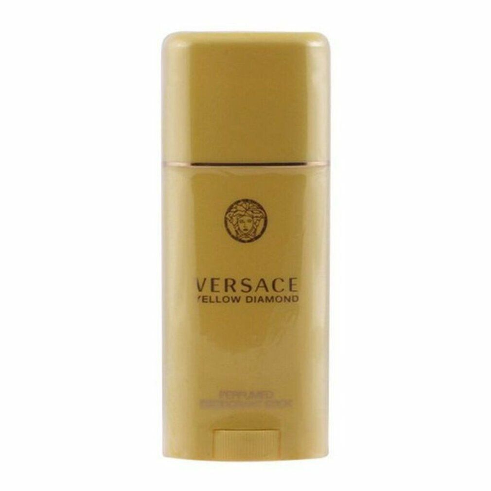Gelber Deodorant-Stick. Aufschrift: VERSACE YELLOW DIAMOND. Goldfarbene Details. Unterseite mit Drehmechanismus.