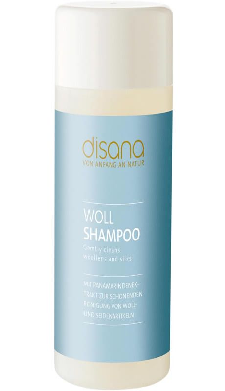 Zylindrische Flasche mit weißem Deckel und blauem Etikett. Aufschrift: disana, Woll Shampoo, sanfte Reinigung für Wolle und Seide.