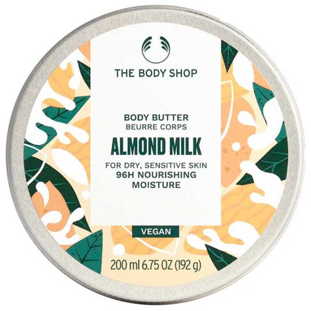 Runde Dose mit Deckel. Aufschrift: The Body Shop, Body Butter Almond Milk. Für trockene, empfindliche Haut. Vegan. 200 ml.