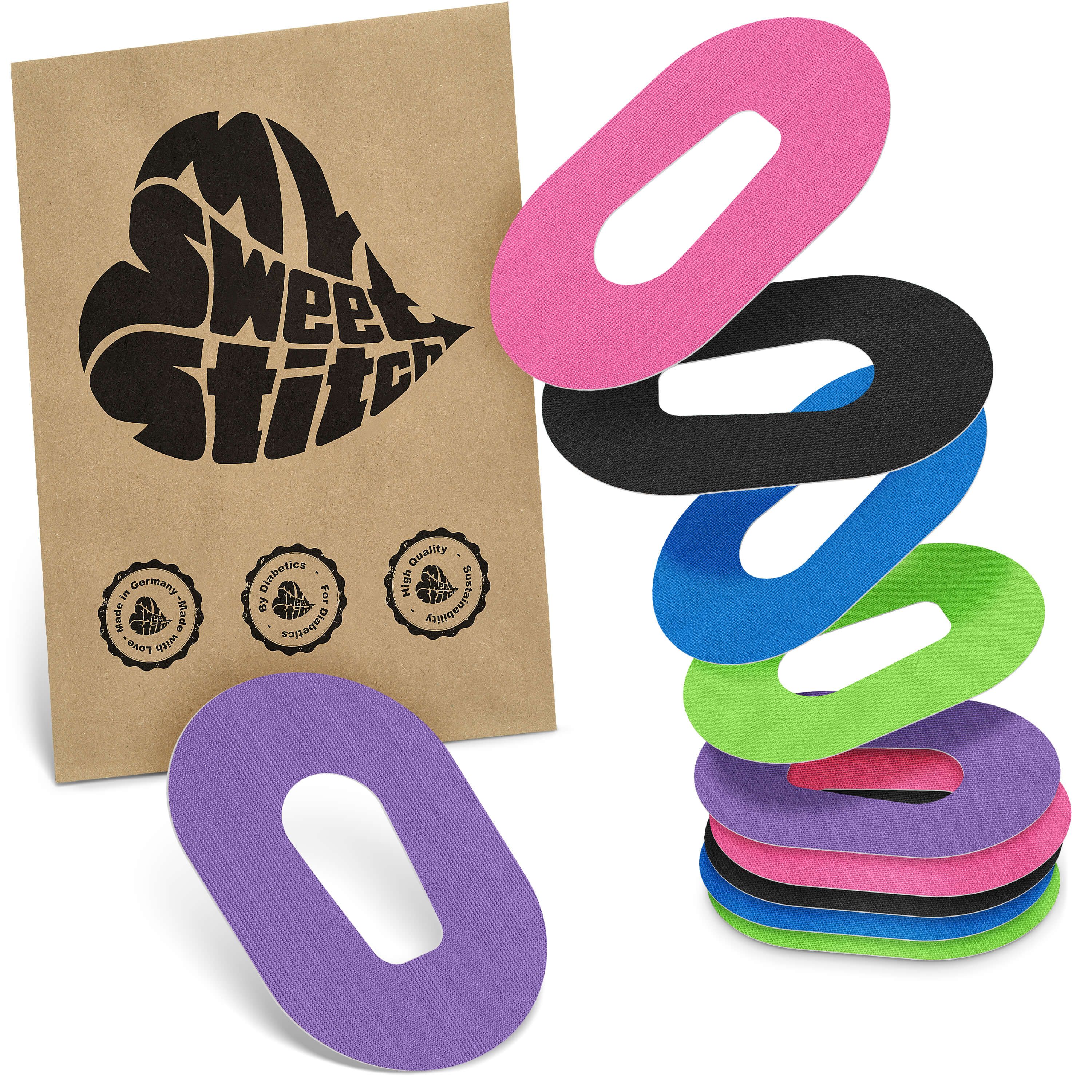 Beutel mit Aufklebern. Mehrfarbige Pflaster mit ovaler Form und Loch in der Mitte. Auf dem Beutel steht "MySweetStitch".