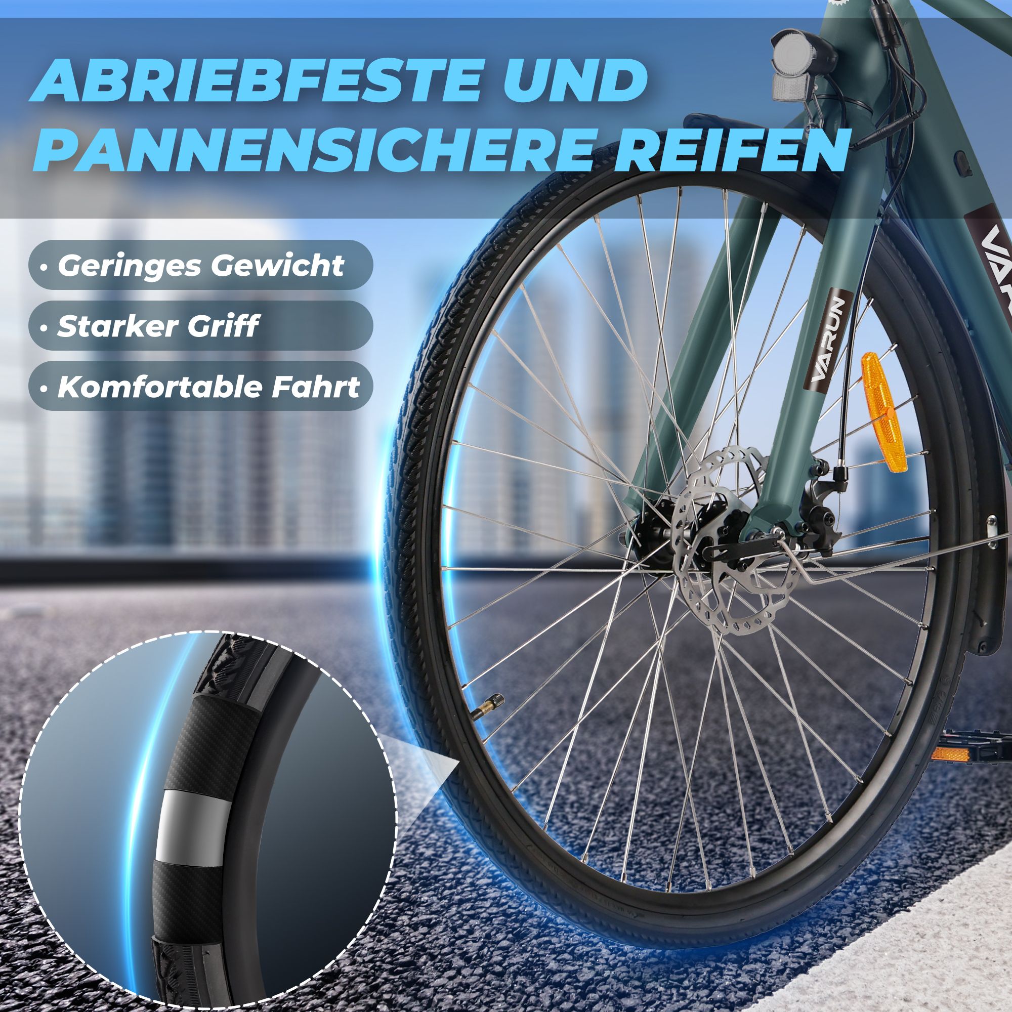 VARUN E-Bike, Nahaufnahme des Vorderrads. Text: Abriebfeste und pannensichere Reifen. Merkmale: geringes Gewicht, starker Griff, komfortable Fahrt.