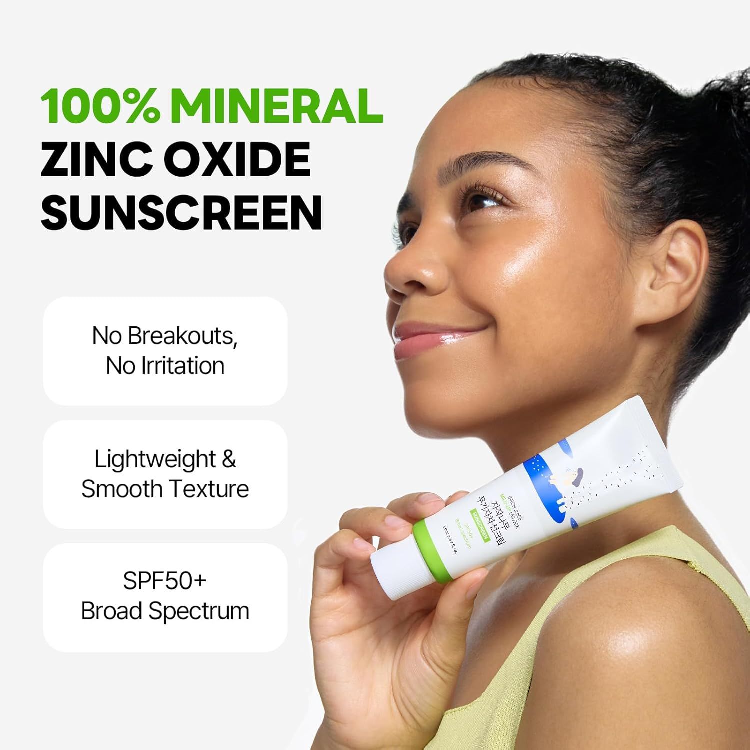 Frau hält Tube. Text: 100% Mineral Zinkoxid Sonnenschutz. Keine Pickel, keine Irritationen. SPF50+.