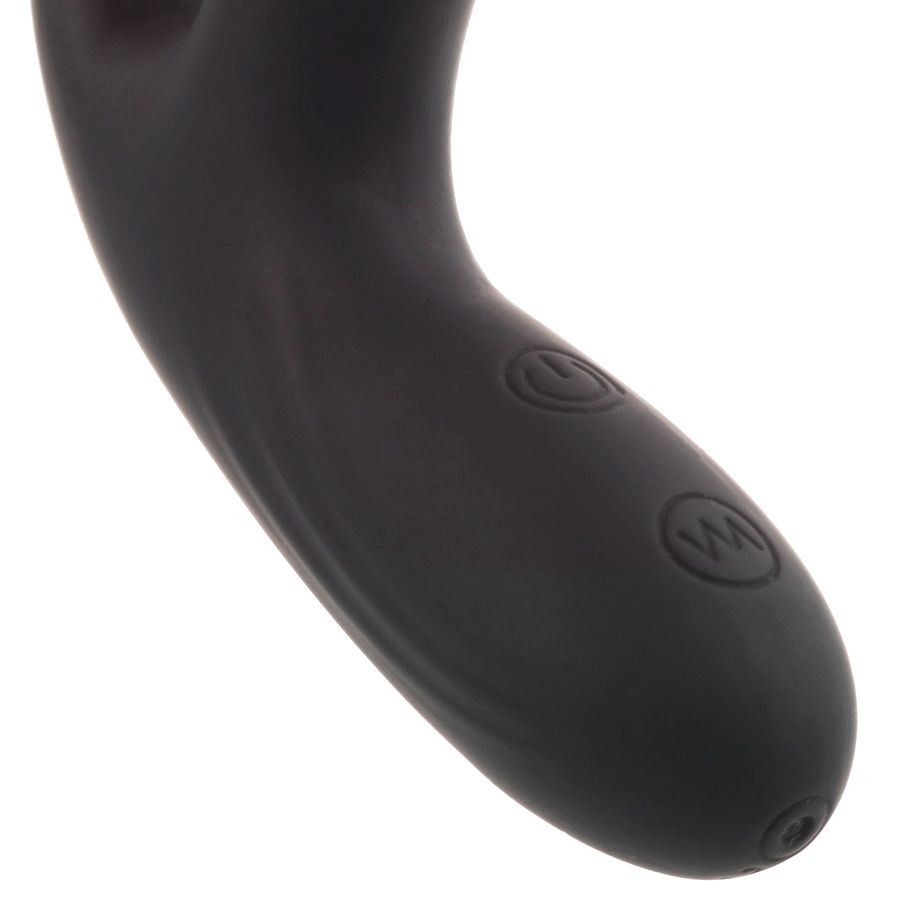 Nahaufnahme eines schwarzen Analvibrators. Sichtbare Bedienelemente mit Symbolen.