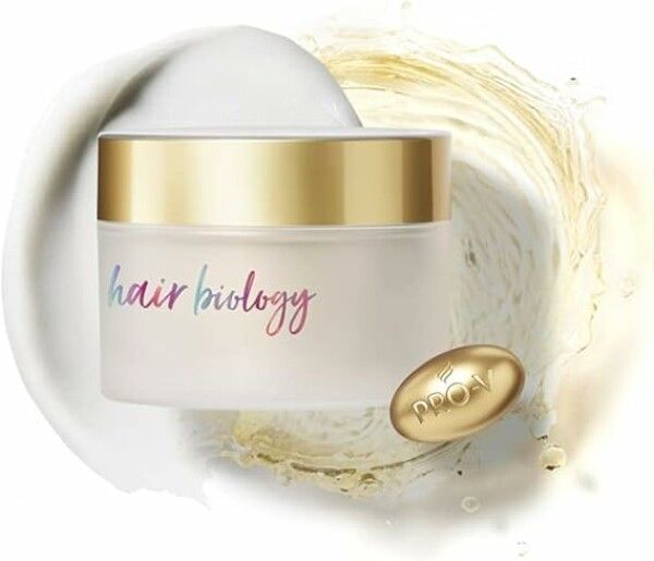 Haarmaske mit goldfarbenem Deckel und Schriftzug "hair biology". Daneben eine goldene Kapsel.