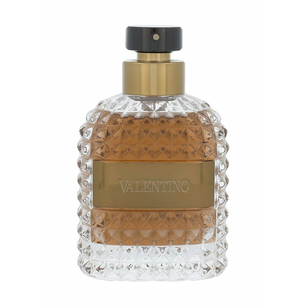 Valentino Uomo Edt Spray Flakon. Transparenter Flakon mit brauner Flüssigkeit. Goldener Hals und schwarzer Verschluss.