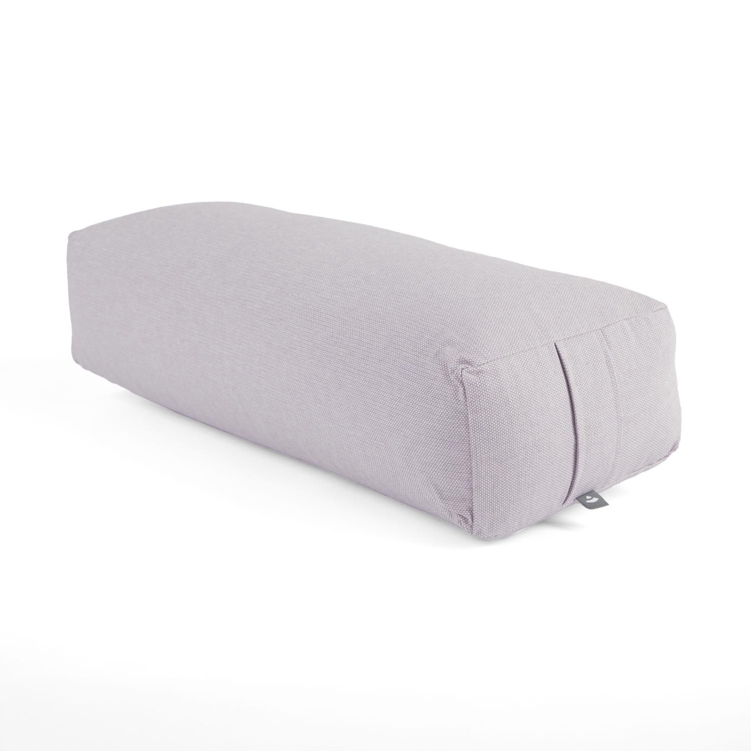 Grauer Yoga Bolster, rechteckig, mit Falten an den Seiten.