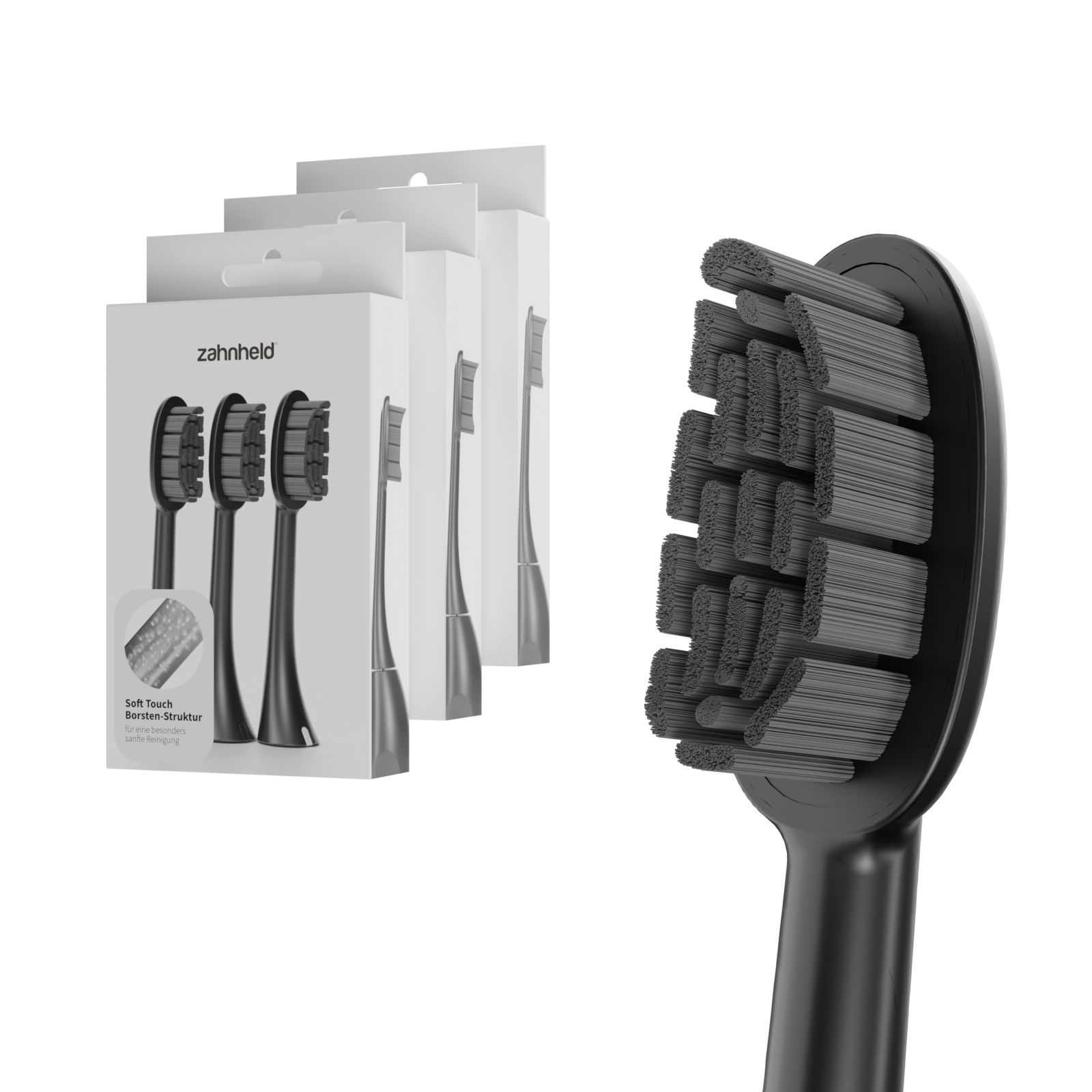 Zahnheld Bürstenkopf, schwarz. Verpackung mit 3 Schachteln. Auf jeder Schachtel ist ein Bürstenkopf abgebildet. Einzelner Bürstenkopf im Vordergrund.