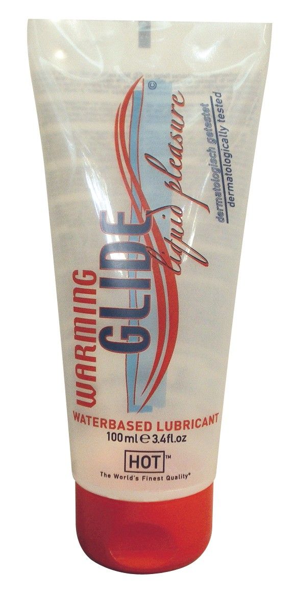 Transparente Tube mit rotem Verschluss. Aufschrift: WARMING GLIDE, liquid pleasure, WATERBASED LUBRICANT. Inhalt: 100ml.
