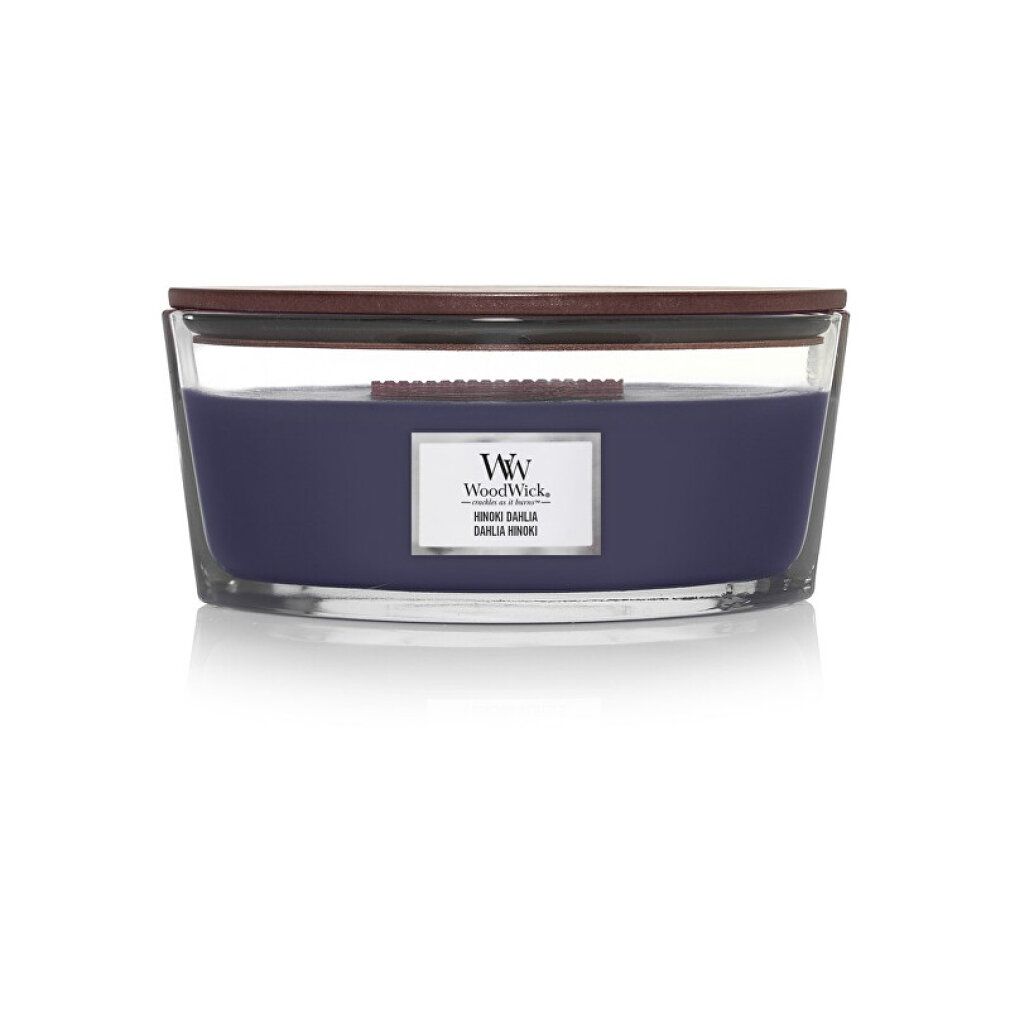 Kerze mit Holzdeckel. Violettes Wachs in Glasbehälter. Label mit Logo und Produktbezeichnung.