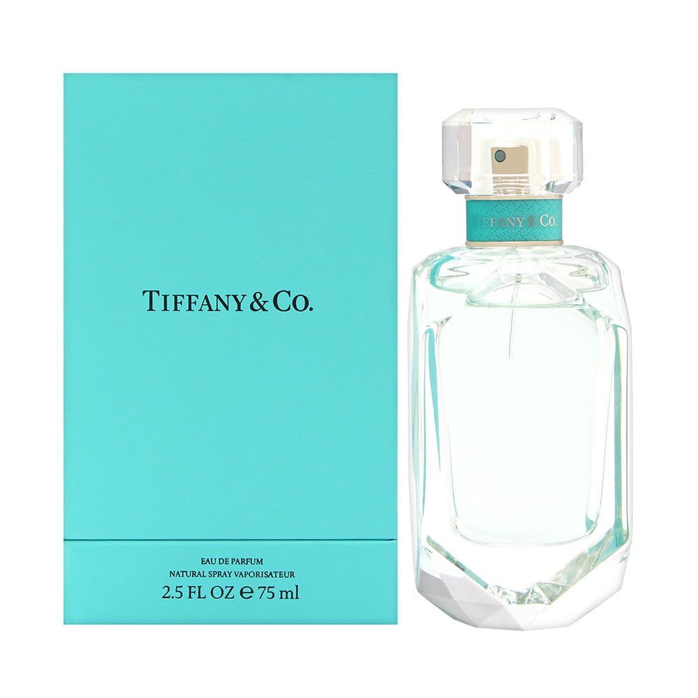 Flakon und Schachtel. Flakon aus Glas, achteckig, mit Deckel. Schachtel türkis mit Schriftzug. Aufschrift: Tiffany & Co.
