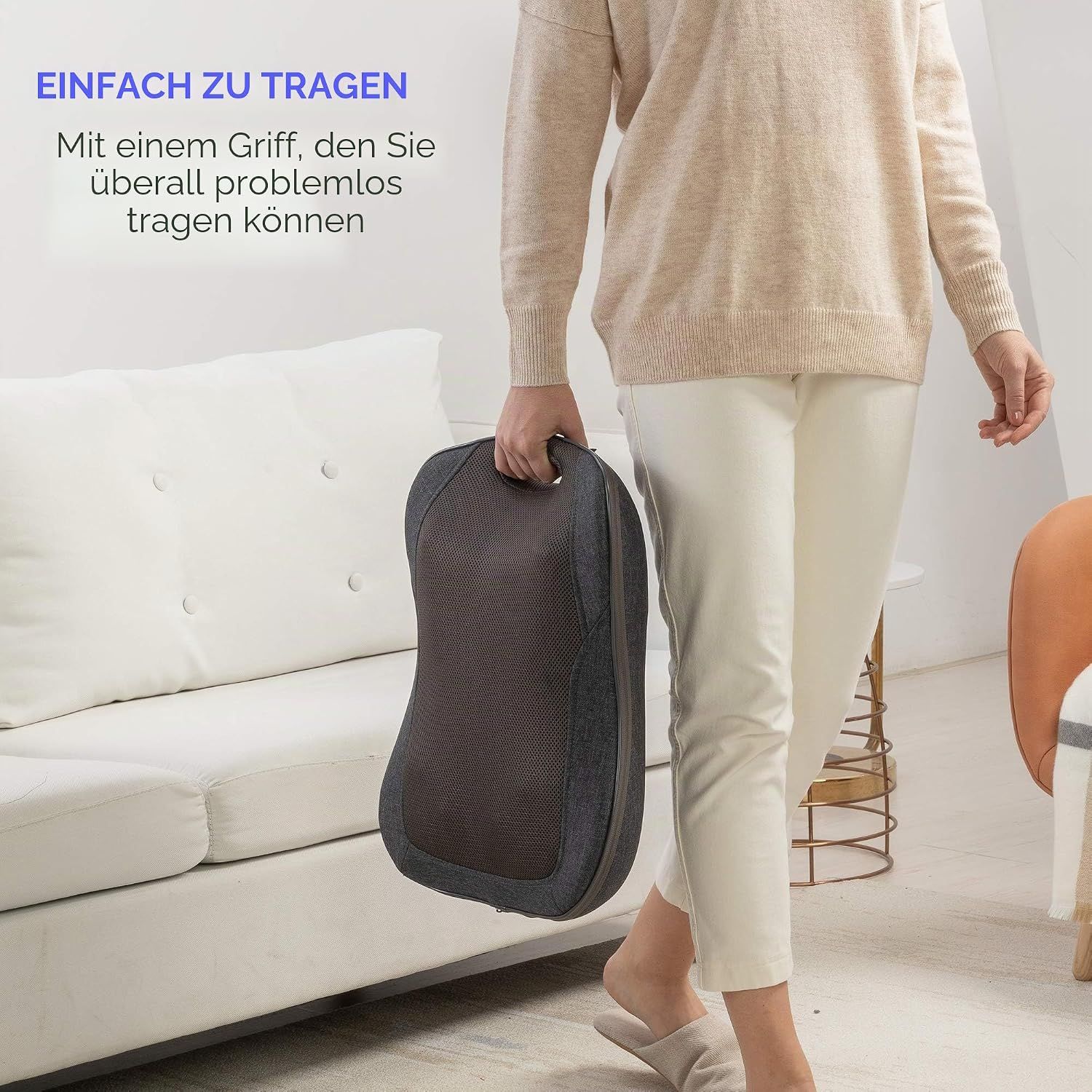 Graues Massagekissen mit Griff, tragbar und vielseitig einsetzbar.