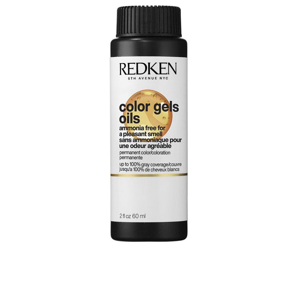 Redken Color Gels Oils Haarfarbe. Schwarze Flasche mit weißem Etikett. Text: ammonia free, permanente Coloration.