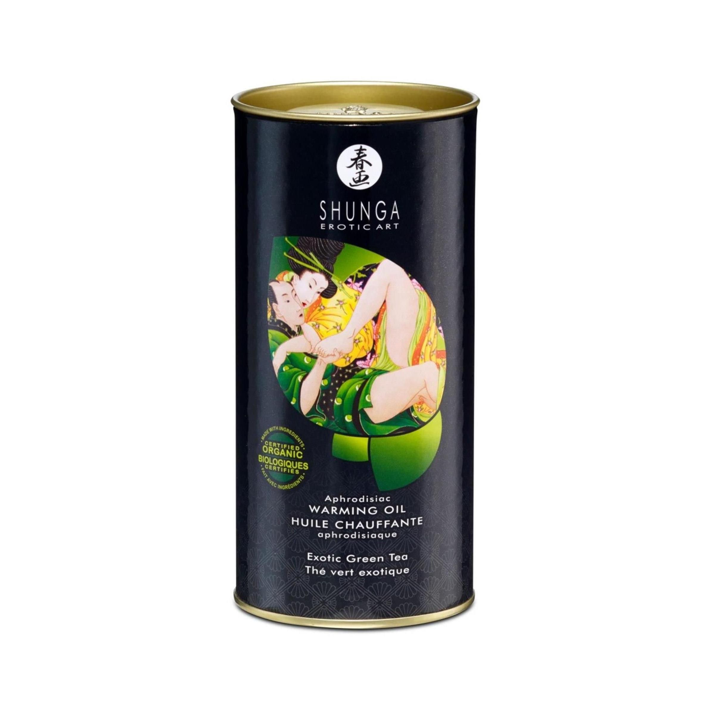 Zylindrische Dose mit Produktabbildung. Aufschrift: SHUNGA, Exotic Art. Text: Warming Oil, Aphrodisiac, Exotic Green Tea.