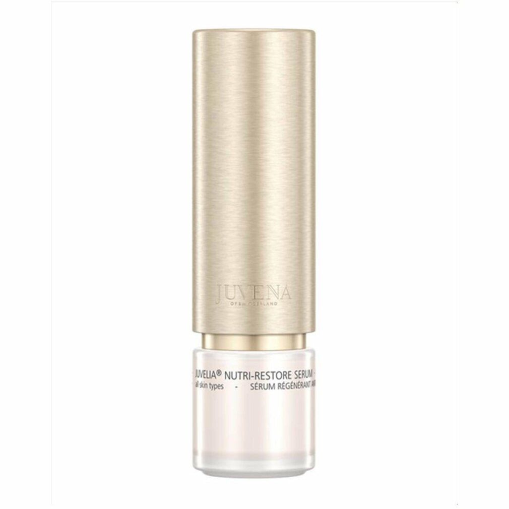 Zylindrische Flasche mit goldenem Deckel. Aufschrift: Juvelia Nutri-Restore Serum.
