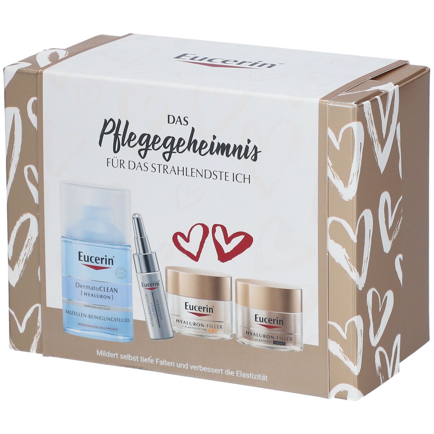Eucerin Geschenkset mit Flasche, Serum und Cremes. Aufschrift: Das Pflegegeheimnis. Produkte auf cremefarbenem Hintergrund.