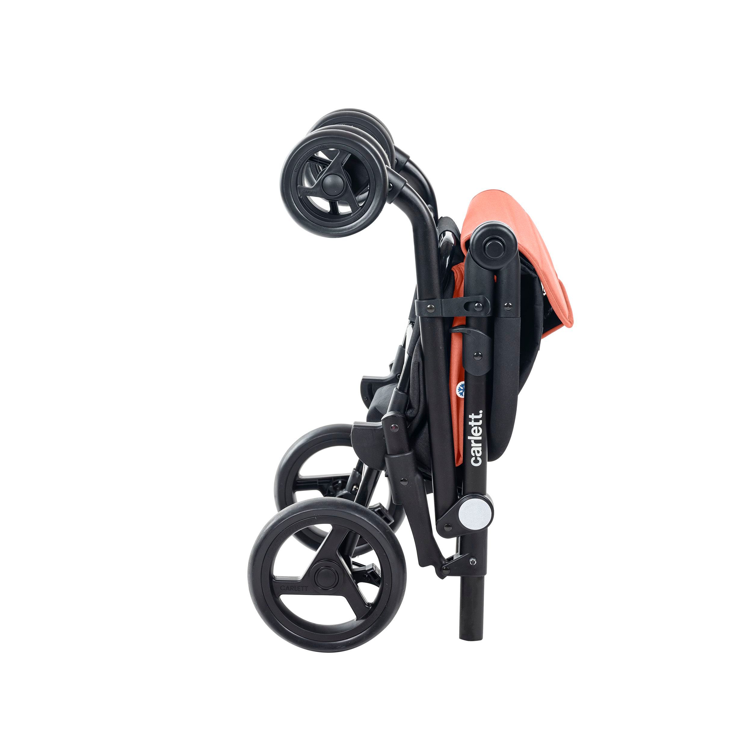 Carlett Urban Quad, zusammengeklappter orangefarbener Einkaufstrolley mit schwarzem Gestell und vier Rädern.