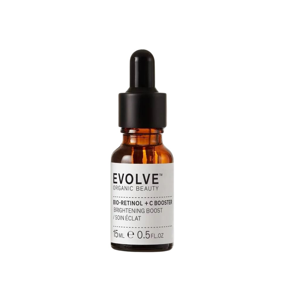 Braune Glasflasche mit schwarzem Deckel und Pipette. Aufschrift: EVOLVE ORGANIC BEAUTY, BIO-RETINOL + C BOOSTER, BRIGHTENING BOOST, 15ml.
