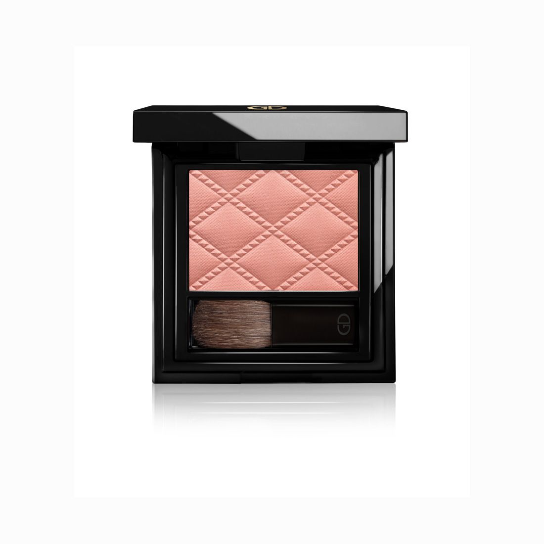 Blush in schwarzer Kompaktverpackung. Rosa Puder mit Rautenmuster. Inklusive Pinsel.