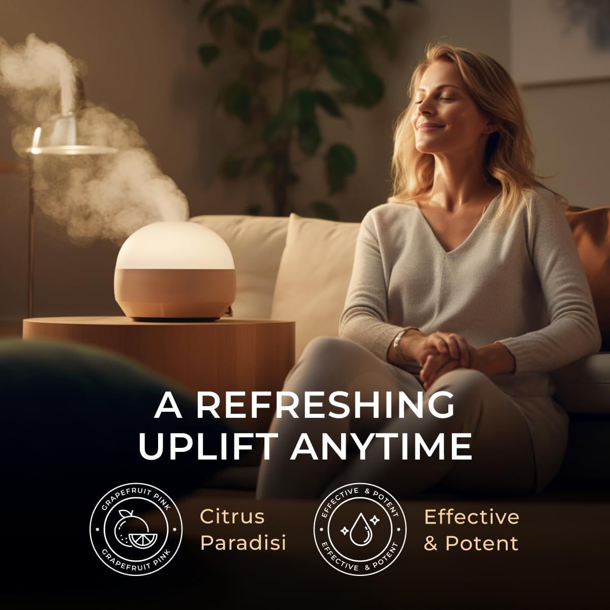 Diffusor mit Dampf, Frau sitzt entspannt. Text: "A Refreshing Uplift Anytime". Logos: Grapefruit Pink, Effective & Potent.