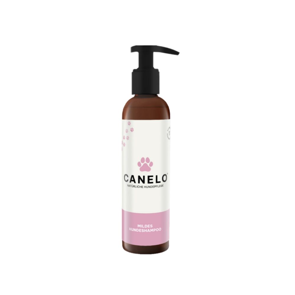 Braune Flasche mit schwarzem Pumpkopf. Aufschrift CANELO und „Mildes Hundeshampoo“ mit Pfoten-Symbol.