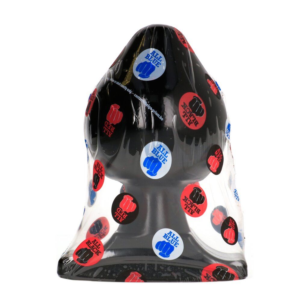 Schwarzer Butt Plug in transparenter Verpackung mit runden Aufklebern.