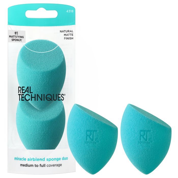 Zwei türkisfarbene Make-up-Schwämme in Verpackung. Aufschrift: Real Techniques, Miracle Airblend Sponge Duo.