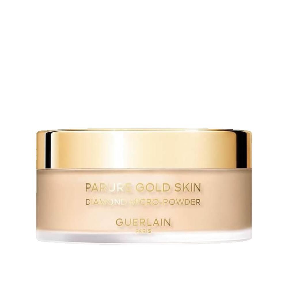 Beige Puder in einem runden Behälter mit goldenem Deckel. Aufschrift: PARURE GOLD SKIN, DIAMOND MICRO-POWDER, GUERLAIN PARIS.