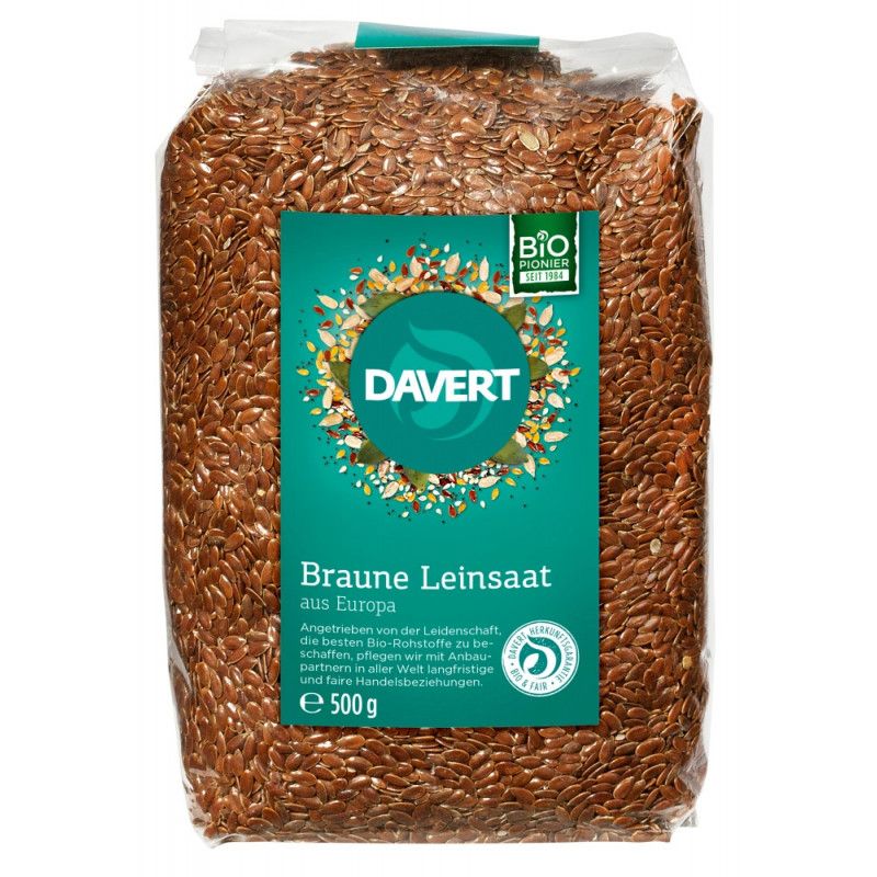 Transparente Verpackung mit braunen Leinsamen. Auf einem grünen Etikett steht "DAVERT" und "Braune Leinsaat". Bio-Siegel und Gewichtsangabe.