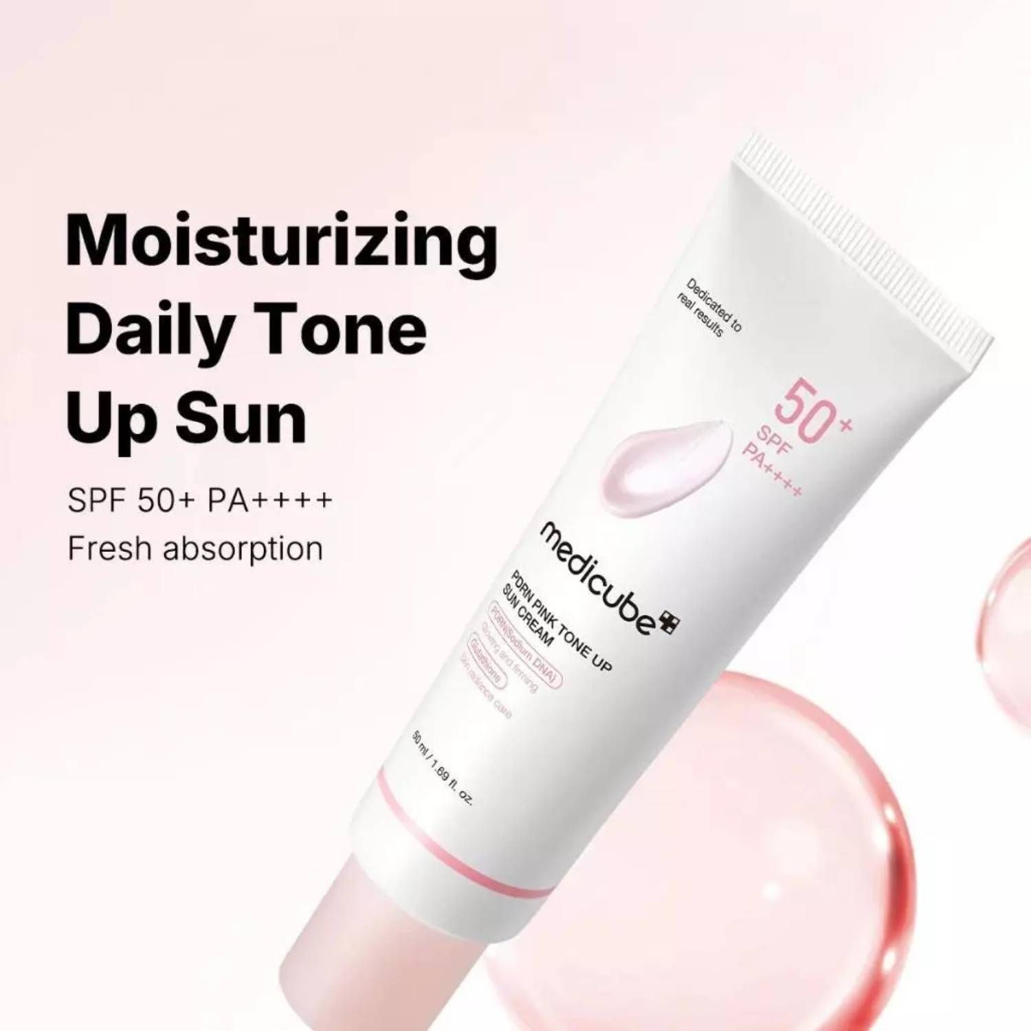 Creme-Tube Medicube PDRN Pink Tone Up Sun Cream. SPF 50+. Text: Moisturizing Daily Tone Up Sun, Fresh absorption.