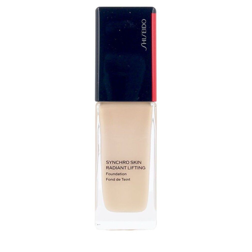 Shiseido Synchro Skin Radiant Lifting Foundation Flakon. Rechteckige Form, transparente Basis, schwarzer Deckel mit rotem Akzent. Text.