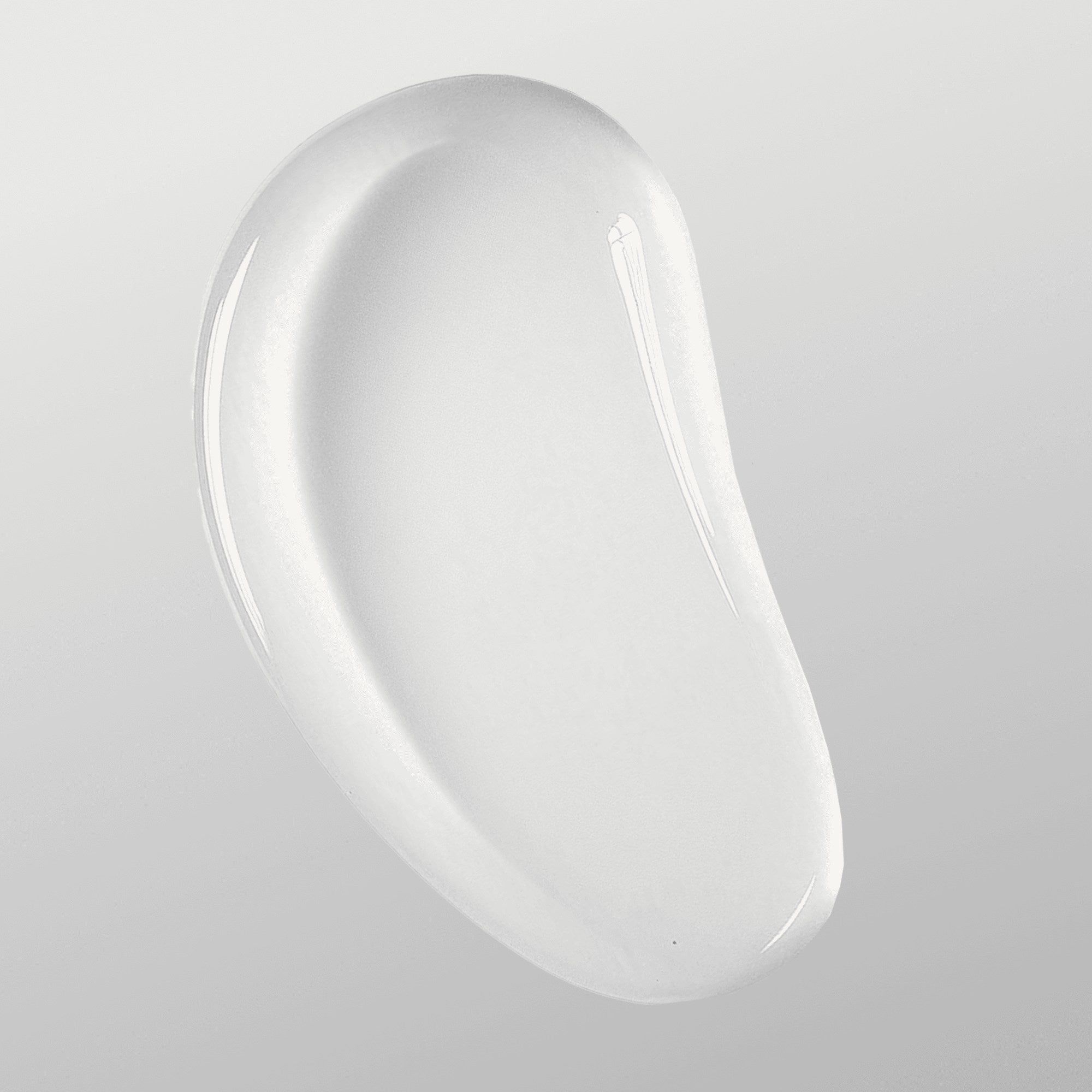 Auslaufende, weiße Creme. Glatte Textur. Auf hellem Hintergrund.