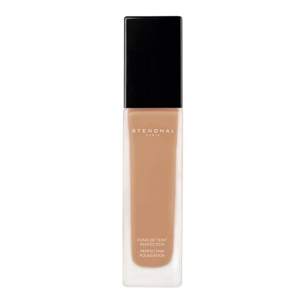Flakon mit beigefarbenem Inhalt. Schwarzer Deckel. Schriftzug: Stendhal Paris, Fond de Teint Perfection, Perfecting Foundation.