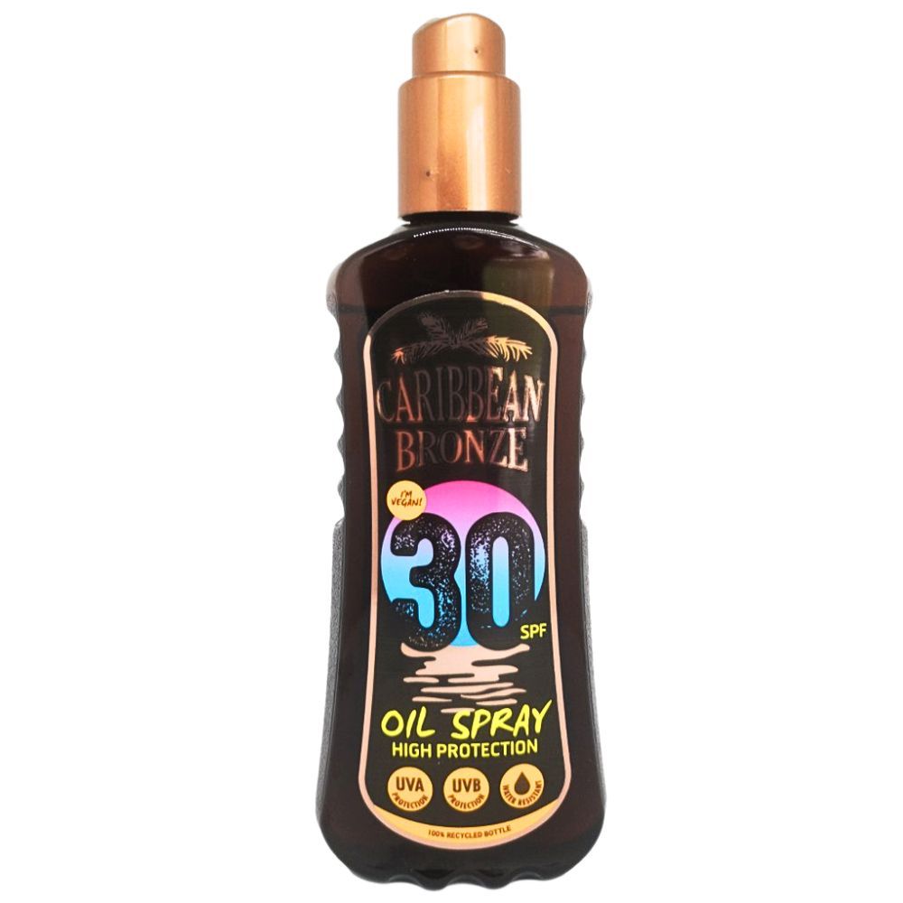 Braune Flasche mit Sprühkopf. Aufschrift: Caribbean Bronze, LSF 30, Oil Spray. UVA, UVB Schutz. 100% recycelte Flasche.