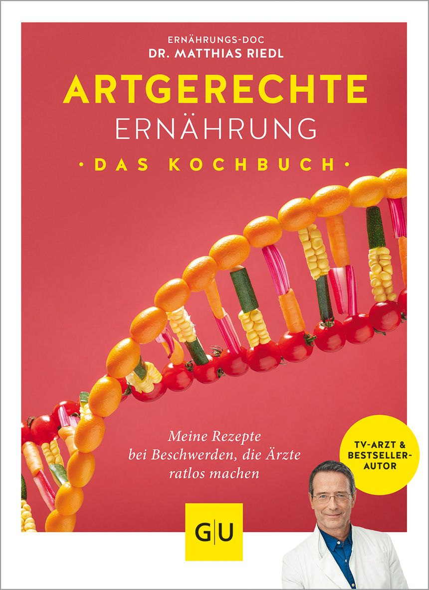 Buchcover: "Artgerechte Ernährung – Das Kochbuch". Titel in Gelb auf rotem Hintergrund. DNA-Strang aus Gemüse. Autor: Dr. Matthias Riedl.